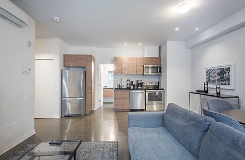 International District Apartment | Luxury Old Montreal Suite with Soaring Ceilings