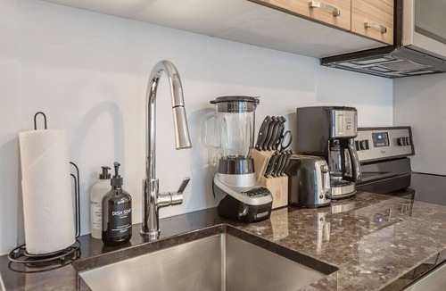 International District Apartment | Luxury Old Montreal Suite with Soaring Ceilings