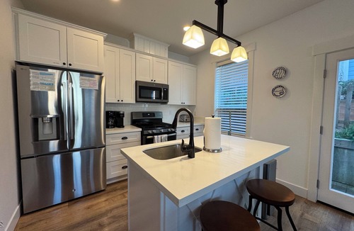 Olivia Beach House | Luxury Olivia Beach Retreat - Hot Tub, Game Room & Pet Friendly