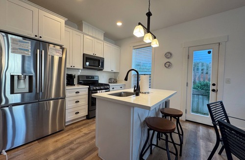 Olivia Beach House | Luxury Olivia Beach Retreat - Hot Tub, Game Room & Pet Friendly