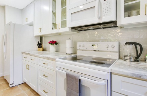 Hunt Club Condo | Luxury PGA National Golf Villa - Lanai - Walk to Resort
