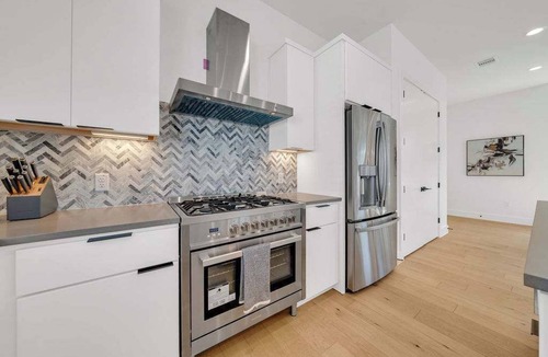 Riverside House | Luxury Pool Retreat, Game Room, Sleeps 24