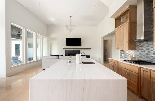 Tulsa House | Luxury Riverside Home with Theatre