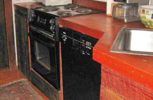 Siasconset Cottage | Luxury Rose Covered Cottage