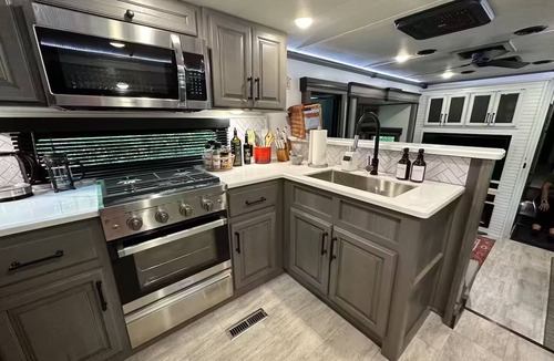Lake Helen House | Luxury RV glamping with fire pit; charming & cozy; secluded yet close to town