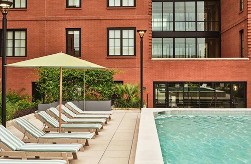 Yamacraw Village Apartment | Luxury Savannah Loft + Pool, Bikes & Dining