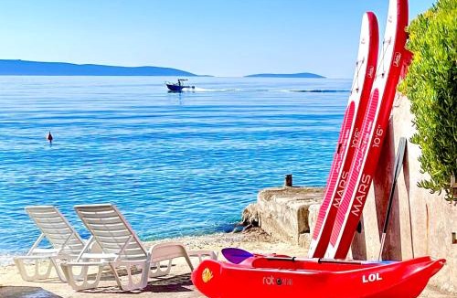 Okrug Gornji Villa | Luxury Seaside Villa with a classic Mediterranean Olive Garden, a fully equipped Professional Kitchen, Pool, Sauna, Padle Boards and Canoe - Miolin Beach House