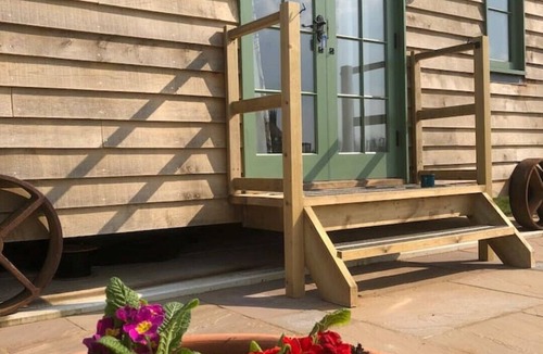 Stone in Oxney Cabin | Luxury Shepherd's Hut with woodburnern