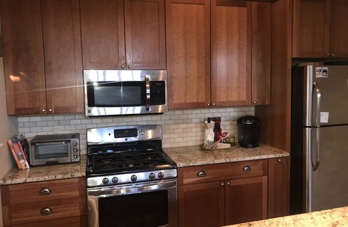 Ludlow House | Luxury Ski In Ski Out Okemo Trailside Condo on Sachem Trail -Direct Ski Access