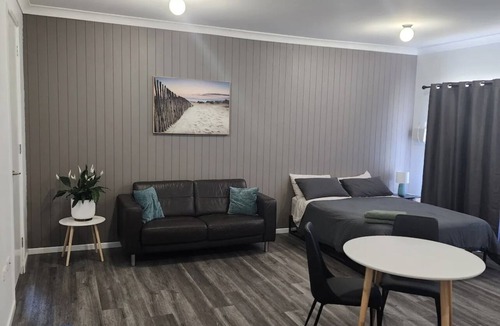 Chilcotts Grass Apartment | Luxury studio with shared laundry