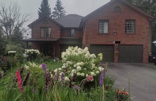 Highland Creek House | Luxury Suites at Military Trail