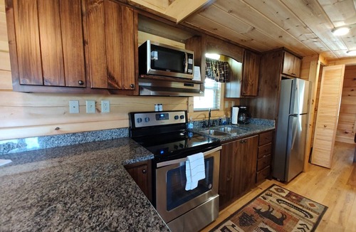 Andrews Cabin | Luxury tiny cabin on the Valley River with mountain views.
