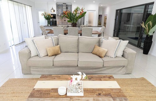 Trinity Beach Villa | Luxury Tropical Escape: Beachside Villa with Heated Pool & Modern Comforts