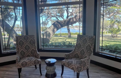Tarpon Springs Villa | Luxury Waterfront Oasis Pool & Gulf Access Dock