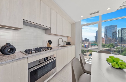 West Loop Hotel | Luxury West Loop Stay: Modern Suites w/Balcony, Resort Amenities & City Views