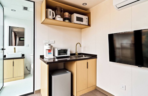 Taos Apartment | LUXX Space Cabin Tiny House with rooftop deck, private fenced patio.
