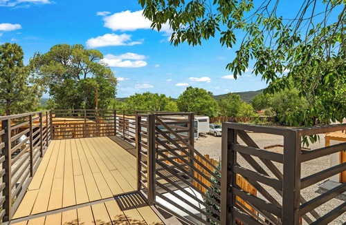 Taos Apartment | LUXX Space Cabin Tiny House with rooftop deck, private fenced patio.