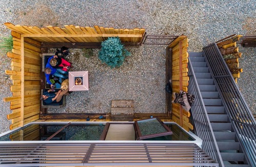 Taos Apartment | LUXX Space Cabin Tiny House with rooftop deck, private fenced patio.
