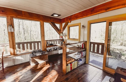 Hovland Cabin | Mökki Hovland Hut - A Unique Glass Wall Timber Frame Nestled in a Maple Forest