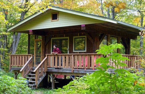 Hovland Cabin | Mökki Hovland Hut - A Unique Glass Wall Timber Frame Nestled in a Maple Forest