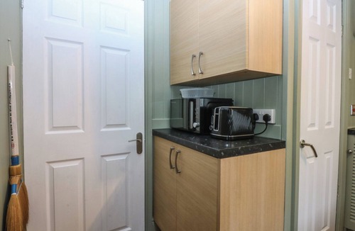 Llandanwg Cottage | MAESAWEL STUDIO, with a garden in Llanfair