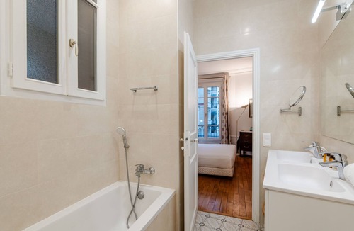 Quartier de l'Ecole-Militaire Apartment | Magic of Light, by Veeve