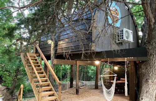 Rosston House | Magical Treehouse Retreat with Creek Views near Forestburg Forest in Forestburg, Texas