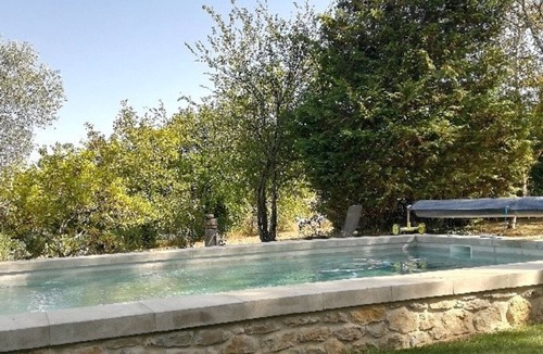 Saint-Marcel-de-Careiret Cottage | Magnificent stone cottage with jacuzzi, swimming pool and large wooded grounds.