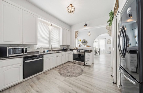 Austin Ave. House | Magnolia Blossom ,1920's Charm Meets Modern Luxury