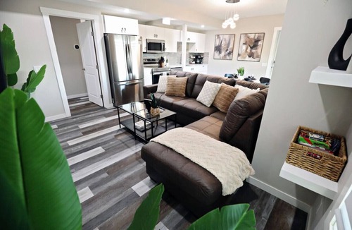 Southeast Calgary Condo | Mahogany Lakefront 2BR Walkout | Trails & Privacy