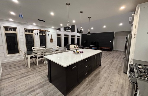Woody Point Ski Chalet | Main Chalet#1 Waterfront Sleeps 16 open concept Kitchen-Living area, 2.5 baths