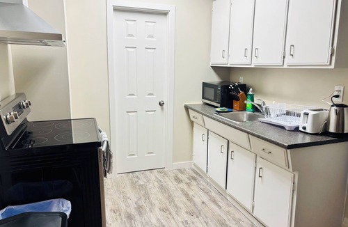 Beltline House | Main Floor 1 Bedroom Suite with Parking