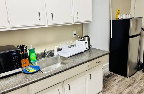 Beltline House | Main Floor 1 Bedroom Suite with Parking