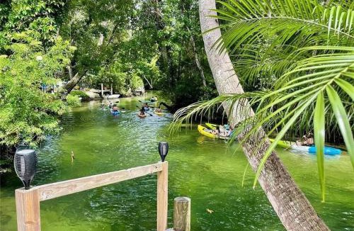 Weeki Wachee Gardens Villa | Main River Retreat hot tub, canoe with trolling motor