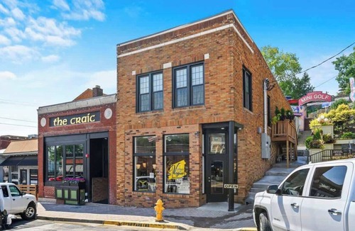 Parkville Apartment | Main Street Penthouse Walkable King Bed+Dining