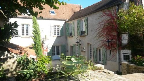 Magny-les-Hameaux Bed & Breakfast | Maison d'hôtes La Source