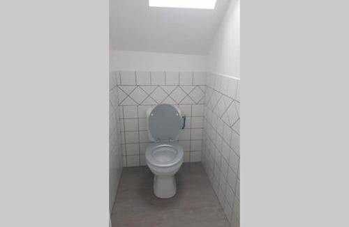 Grez-en-Bouere Apartment | Maison de bourg avec extérieur.