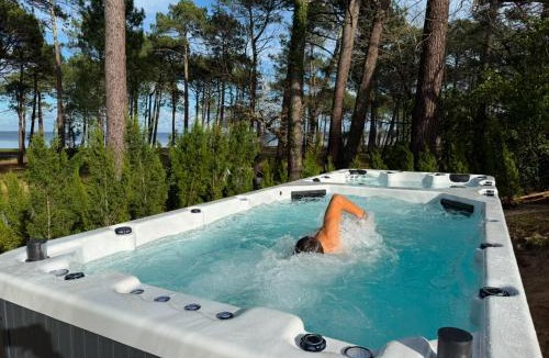 Biscarrosse Villa | Maison du Lac avec Lagon, Spa de Nage, Jacuzzi