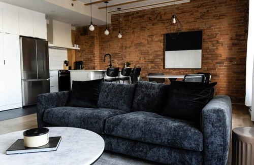 Old Montreal Apartment | Maison Place Royale Luxury Waterfront One-Bedroom Apartment Old Montreal Water View St. Lawrence River Full Kitchen Stone Walls Wi-Fi AC