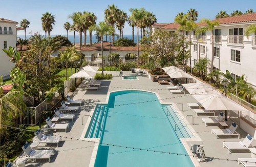 Carlsbad Hotel | Make Your Trip More Enjoyable! Outdoor Pool, Parking, Pets Allowed!