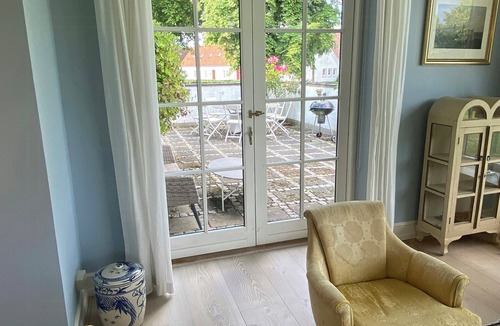 Ringe House | Manor house overlooking fields and garden