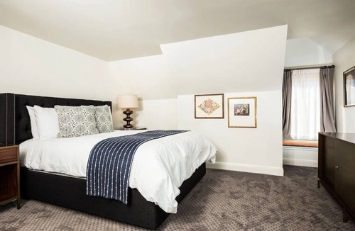 West Campus Hotel | Mansion Queen, Hotel Ella, Historic Elegance, Modern Comforts, Central Location