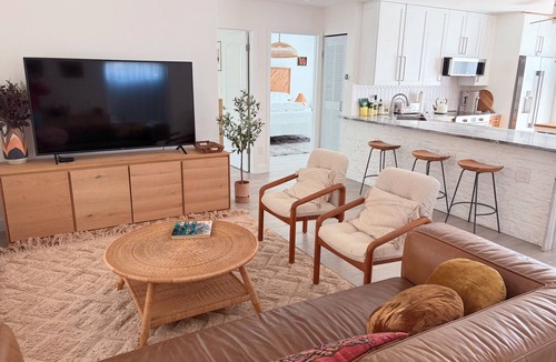 Central Corals House | Marigold House - Tropical Getaway w/large yard & heated pool 2 mi from the beach