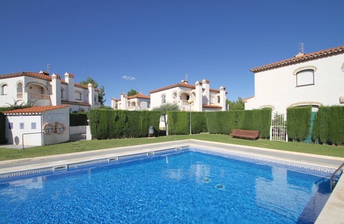 Miami Platja Ski Chalet | MASIA1 adosado con jardín privado y piscina comun