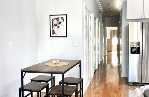 McGinley Square Apartment | Massive 4-bedroom, 3-bathroom apartment with shared yard & bonus garage parking