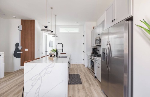 Katie Hill Neighborhood House | Massive Luxury Home w/Rooftop, Hot-tub, Game room, Mini Golf, Views, and more