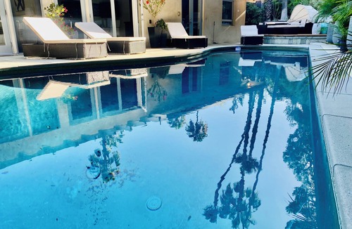 Melrose Villa | Master suite with a pool view