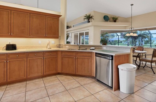 White Marsh House | Medalist - Stunning lake side home with pool