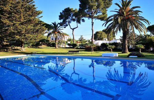 Sant Feliu de Guixols Apartment | Mediterranean apartment in a rustic style.