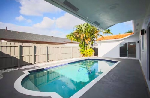 Richmond West House | Miami Retreat with Backyard Pool
